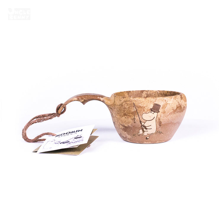 a pair of scissors on a white surface