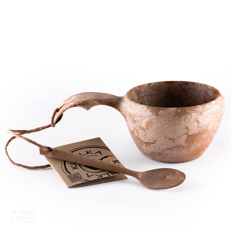 a pair of scissors sitting on top of a table