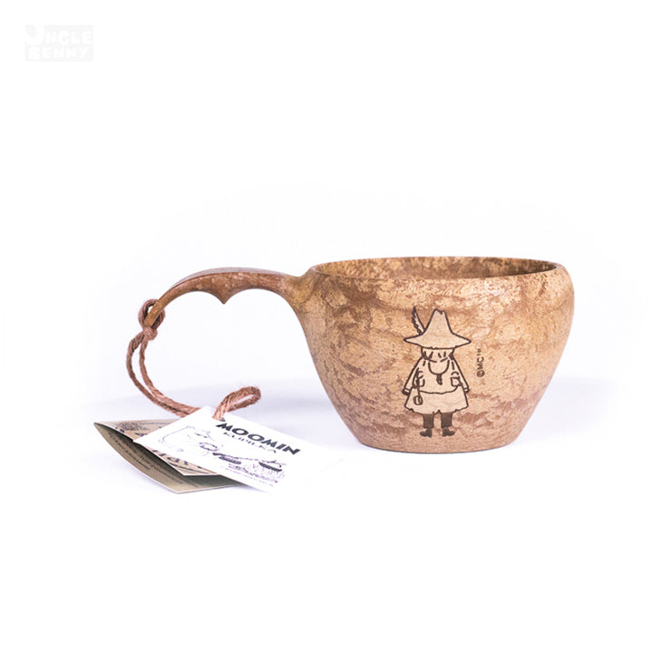 a close up of a piece of fabric with a pair of scissors