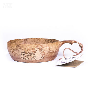 a pair of scissors sitting on top of a table