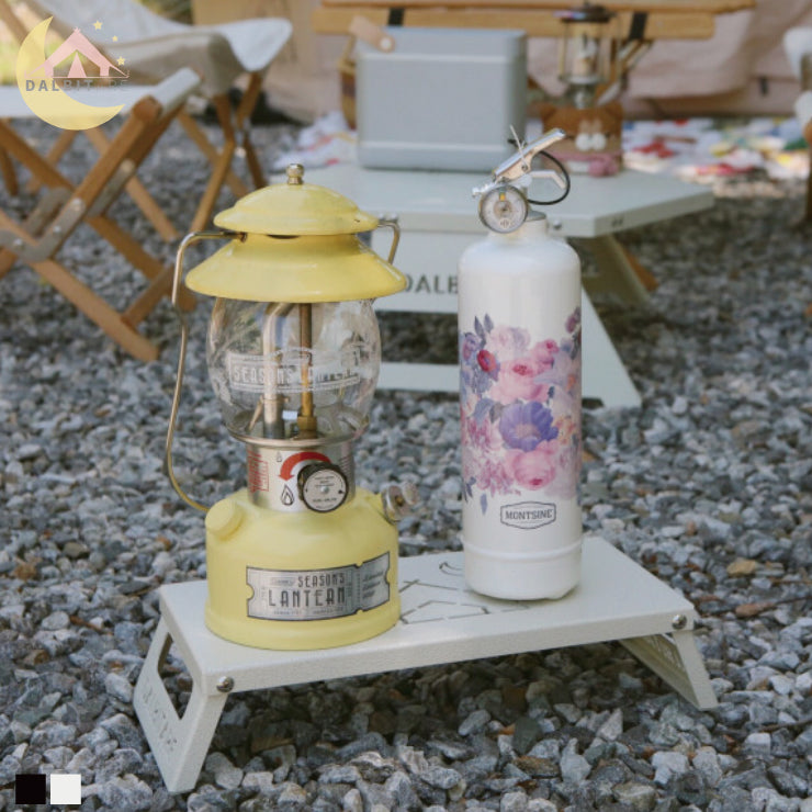 a fire hydrant sitting next to a yellow fire hydrant 