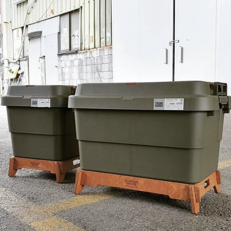 a couple of toilets are sitting on the ground 