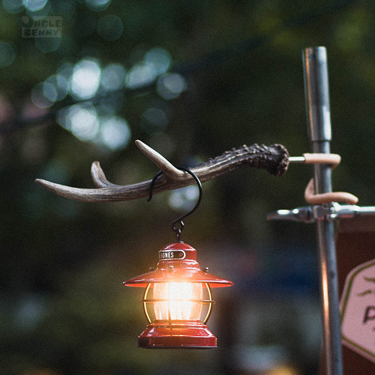 a fire hydrant with a light on top 